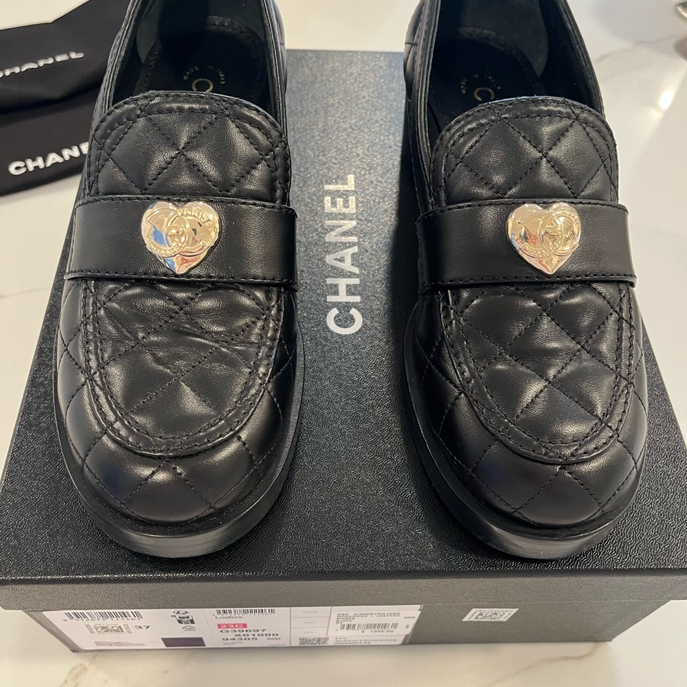Chanel quilted loafer. Lamb skin w/interlocking hearts. Worn in house to test